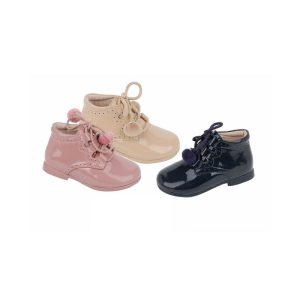 Merceditas abotinadas pompones en cordones
